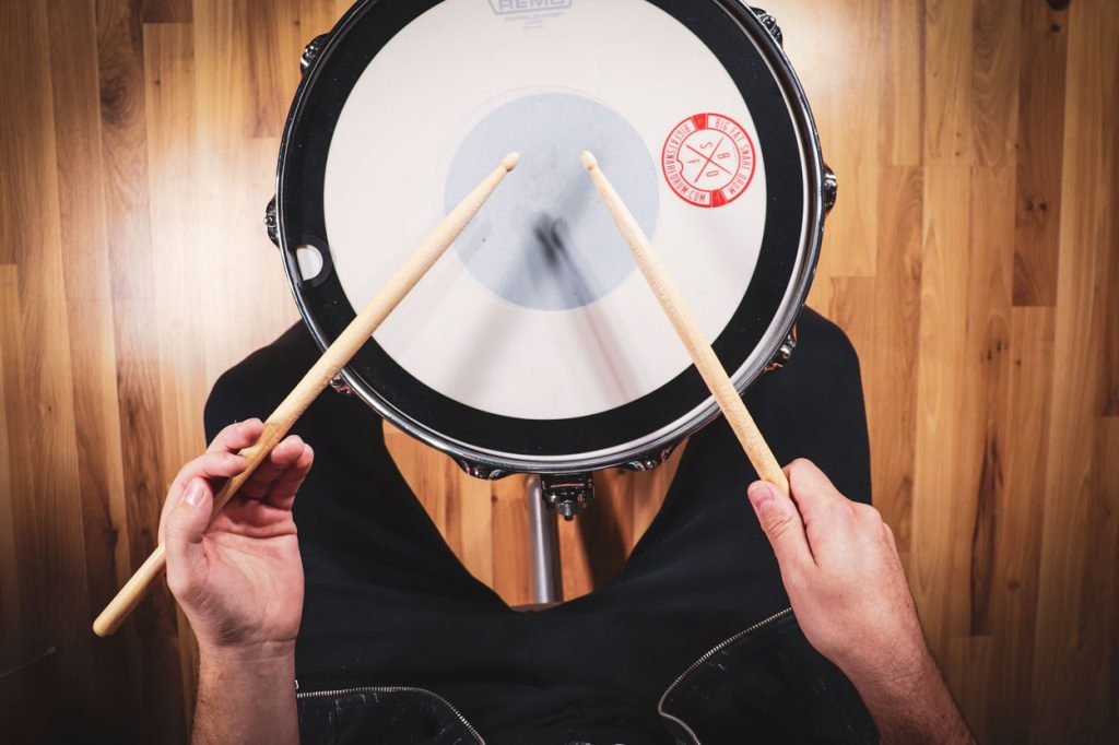 Drummer Holding Sticks